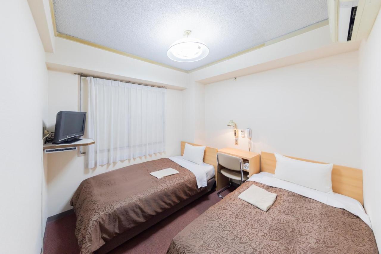 Sunny Stone Hotel Suita Exterior photo