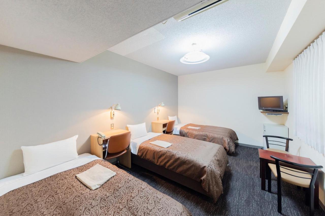 Sunny Stone Hotel Suita Exterior photo